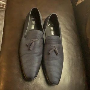 Dark blue Steve Madden shoes .